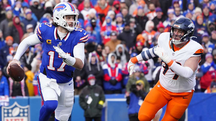 Buffalo Bills QB Josh Allen runs for a gain during the fourth quarter as Denver Broncos DE Zach Allen defends.