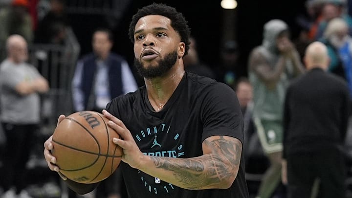 Nov 16, 2024; Charlotte, North Carolina, USA; Charlotte Hornets forward Miles Bridges (0) during pregame warmups against the Milwaukee Bucks at Spectrum Center. Mandatory Credit: Jim Dedmon-Imagn Images
