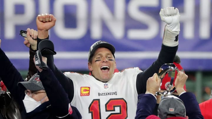 Tom Brady celebrates as the Buccaneers are presented with the NFC championship trophy.

Nfl Nfc Championship Game Tampa Bay Buccaneers At Green Bay Packers