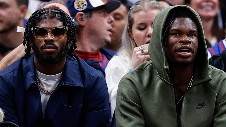 Oct 24, 2023; Denver, Colorado, USA; University of Colorado Buffaloes football players Shedeur Sanders (L) and Travis Hunter (R) watch during the third period between the Denver Nuggets and the Los Angeles Lakers at Ball Arena. Mandatory Credit: Isaiah J. Downing-Imagn Images Oct 24, 2023; Denver, Colorado, USA; University of Colorado Buffaloes football players Shedeur Sanders (L) and Travis Hunter (R) watch during the third period between the Denver Nuggets and the Los Angeles Lakers at Ball Arena. Mandatory Credit: Isaiah J. Downing-Imagn Images