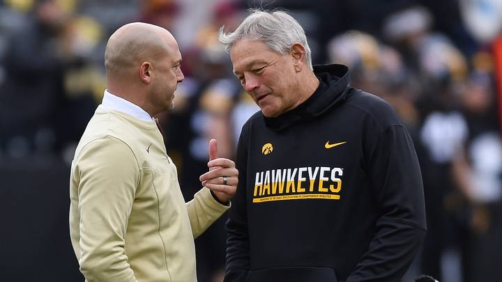 Nov 13, 2021; Iowa City, Iowa, USA; Minnesota Golden Gophers head coach P. J. Fleck (left) and Iowa Hawkeyes head coach Kirk Ferentz (right) talk before the game at Kinnick Stadium. Mandatory Credit: Jeffrey Becker-USA TODAY Sports Nov 13, 2021; Iowa City, Iowa, USA; Minnesota Golden Gophers head coach P. J. Fleck (left) and Iowa Hawkeyes head coach Kirk Ferentz (right) talk before the game at Kinnick Stadium. Mandatory Credit: Jeffrey Becker-USA TODAY Sports