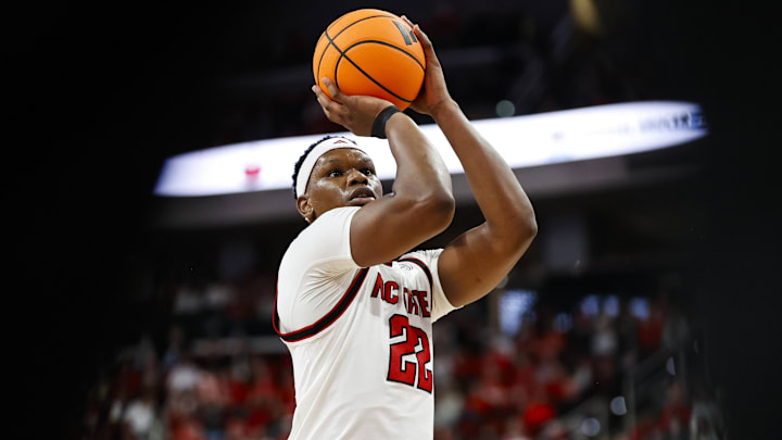 Dec 6, 2025; Raleigh, North Carolina, USA; NC State Wolfpack forward Ven-Allen Lubin (22) shoots a free throw during the first half of the game against UNC Asheville Bulldogs at Lenovo Center. Mandatory Credit: Jaylynn Nash-Imagn Images