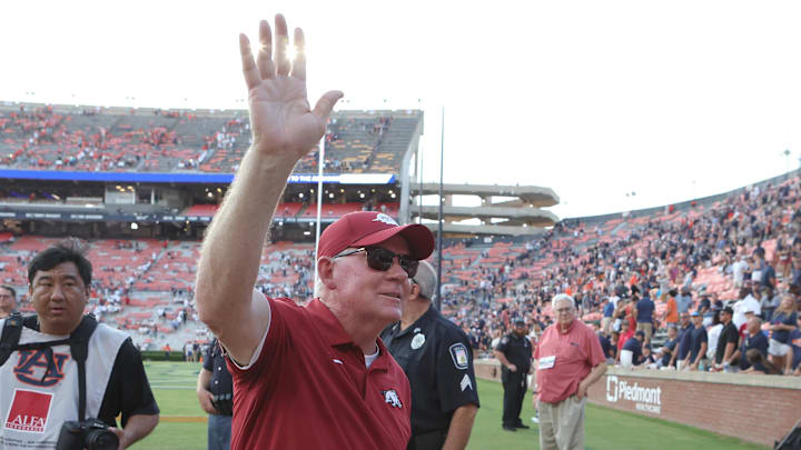 Arkansas Razorbacks offensive coordinator Bobby Petrino waves to fans after the Razorbacks beat the Auburn Tigers at Jordan-Hare Stadium. Arkansas Razorbacks offensive coordinator Bobby Petrino waves to fans after the Razorbacks beat the Auburn Tigers at Jordan-Hare Stadium.