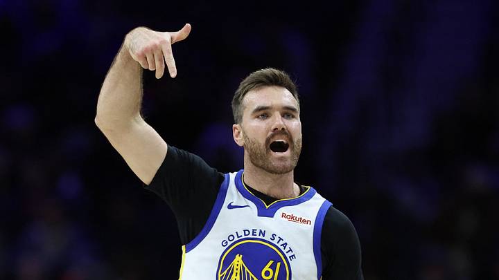 Philadelphia, Pennsylvania, USA; Golden State Warriors guard Pat Spencer (61) reacts to his three pointer against the Philadelphia 76ers during the fourth quarter at Xfinity Mobile Arena on Dec 4, 2025.