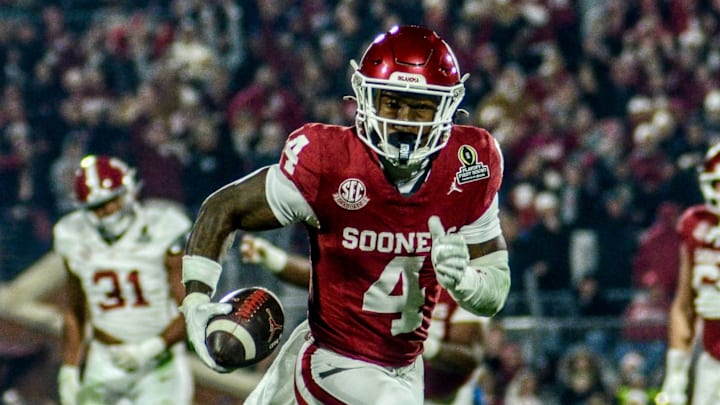 Oklahoma wide receiver Deion Burks catches a pass against Alabama in the CFP.