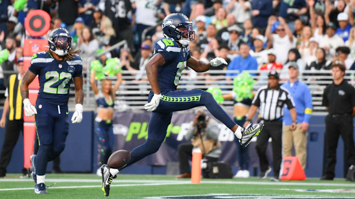 Aug 7, 2025; Seattle, Washington, USA; Seattle Seahawks wide receiver Tory Horton (15) scores a touchdown against the Las Vegas Raiders during the first half at Lumen Field. Aug 7, 2025; Seattle, Washington, USA; Seattle Seahawks wide receiver Tory Horton (15) scores a touchdown against the Las Vegas Raiders during the first half at Lumen Field.