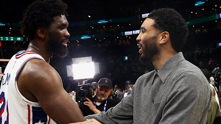 May 2, 2026; Boston, Massachusetts, USA; Philadelphia 76ers center Joel Embiid (21) talks with Boston Celtics forward Jayson Tatum (0) after game seven of the first round of the 2026 NBA Playoffs at TD Garden. Mandatory Credit: Winslow Townson-Imagn Images
