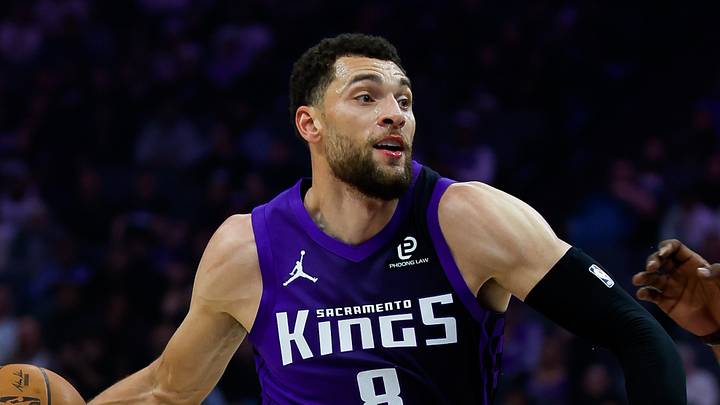 Feb 6, 2026; Sacramento, California, USA; Sacramento Kings guard Zach LaVine (8) drives to the basket against Los Angeles Clippers forward Derrick Jones Jr. (5) during the first quarter at Golden 1 Center. Mandatory Credit: Sergio Estrada-Imagn Images