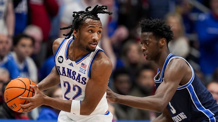 Jan 24, 2026; Columbia, Missouri, USA; Kansas Jayhawks guard Darryn Peterson (22) looks to pass against BYU Cougars forward AJ Dybantsa (3) during the first half at Mizzou Arena.