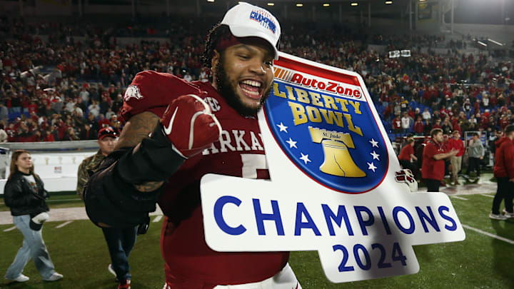 Dec 27, 2024; Memphis, TN, USA; Arkansas Razorbacks defensive linemen Cameron Ball (5) reacts after defeating the Texas Tech Red Raiders at Simmons Bank Liberty Stadium. Mandatory Credit: Petre Thomas-Imagn Images
