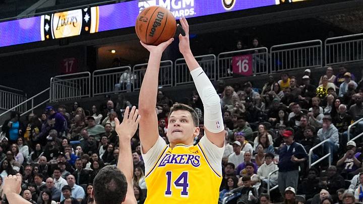 Oct 13, 2026; Las Vegas, Nevada, USA; Los Angeles Lakers center Walker Kessler (14) shoots against Golden State Warriors forward Georges Niang (32) in the first quarter at T-Mobile Arena. Mandatory Credit: Candice Ward-Imagn Images Oct 13, 2026; Las Vegas, Nevada, USA; Los Angeles Lakers center Walker Kessler (14) shoots against Golden State Warriors forward Georges Niang (32) in the first quarter at T-Mobile Arena. Mandatory Credit: Candice Ward-Imagn Images