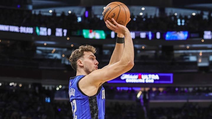 Apr 25, 2025; Orlando, Florida, USA; Orlando Magic forward Franz Wagner (22) shoots a three point basket during the first quarter of game three of first round for the 2024 NBA Playoffs against the Boston Celtics at Kia Center. Mandatory Credit: Mike Watters-Imagn Images