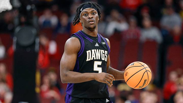 Washington Huskies guard Zoom Diallo (5) brings the ball up court. Mandatory Credit: Kamil Krzaczynski-Imagn Images