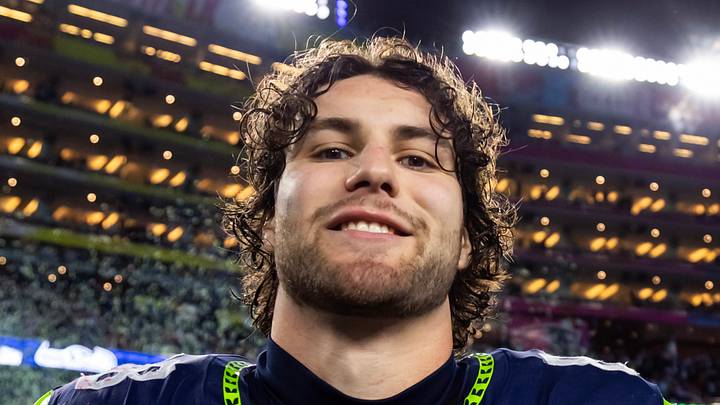 Seattle Seahawks tight end AJ Barner celebrates