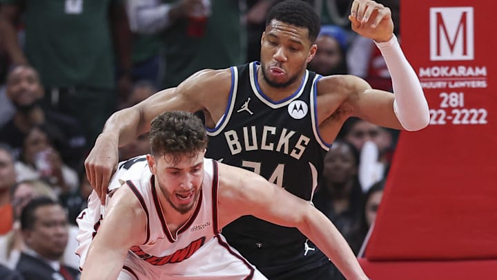 Feb 25, 2025; Houston, Texas, USA; Milwaukee Bucks forward Giannis Antetokounmpo (34) defends against Houston Rockets center Alperen Sengun (28) during the fourth quarter at Toyota Center. Mandatory Credit: Troy Taormina-Imagn Images
