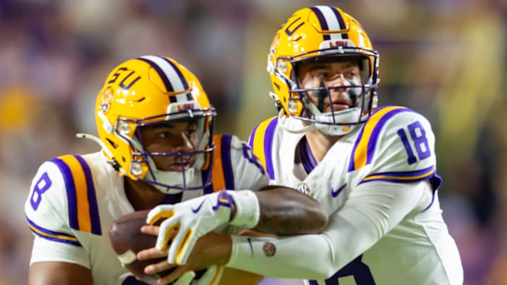 Tigers Quarterback Garrett Nussmeier 18 hands off to JuJuan Johnson 8,, LSU Tigers take on the South Carolina Gamecocks. October 11, 2025; Baton Rouge, Louisiana, USA; at Tiger Stadium.