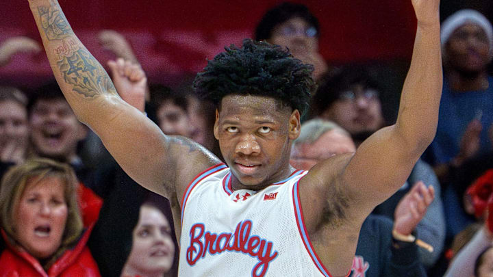 Bradley's Jaquan Johnson celebrates as overtime expires in the Braves' 95-84 win over Belmont on Monday, Feb. 9, 2026 at Carver Arena.