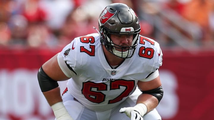Sep 8, 2024; Tampa, Florida, USA; Tampa Bay Buccaneers offensive tackle Luke Goedeke (67) lines up against the Washington Commanders in the first quarter at Raymond James Stadium. Mandatory Credit: Nathan Ray Seebeck-Imagn Images Sep 8, 2024; Tampa, Florida, USA; Tampa Bay Buccaneers offensive tackle Luke Goedeke (67) lines up against the Washington Commanders in the first quarter at Raymond James Stadium. Mandatory Credit: Nathan Ray Seebeck-Imagn Images