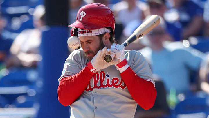 Philadelphia Phillies first baseman Bryce Harper is hit by a pitch against the Toronto Blue Jays during Spring Training.