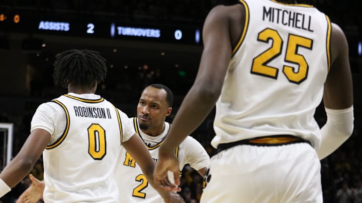 Feb. 19, 2025; Columbia, Missouri, USA; Missouri Tigers guard Anthony Robinson II (0), Tamar Bates (0) and forward Mark Mitchell (25) celebrate against the Alabama Crimson Tide at Mizzou Arena. Feb. 19, 2025; Columbia, Missouri, USA; Missouri Tigers guard Anthony Robinson II (0), Tamar Bates (0) and forward Mark Mitchell (25) celebrate against the Alabama Crimson Tide at Mizzou Arena.