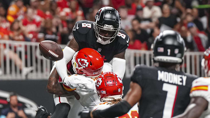 Sep 22, 2024; Atlanta, Georgia, USA; Kansas City Chiefs safety Bryan Cook (6) breaks up a pass against Atlanta Falcons tight end Kyle Pitts (8) in the end zone during the second half at Mercedes-Benz Stadium. Mandatory Credit: Dale Zanine-Imagn Images