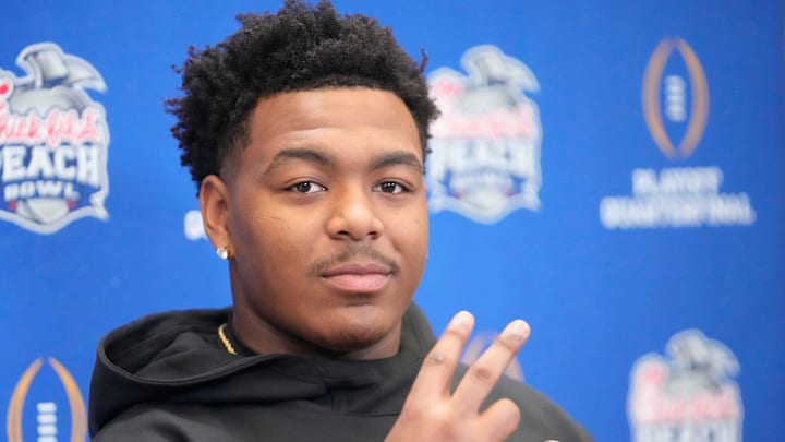 Arizona State defensive lineman C.J. Fite gives the forks up sign during media day for the Chick-fil-A Peach Bowl in Atlanta on Monday, Dec. 30, 2024.