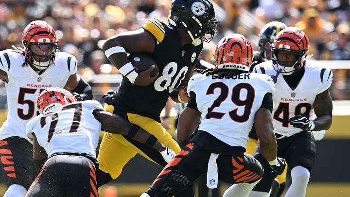 Sep 27, 2026; Pittsburgh, Pennsylvania, USA; Pittsburgh Steelers tight end Darnell Washington (80) runs affer a catch against Cincinnati Bengals safety Jordan Battle (27) and safety Kyle Dugger (29) during the first quarter at Acrisure Stadium. Mandatory Credit: Barry Reeger-Imagn Images Sep 27, 2026; Pittsburgh, Pennsylvania, USA; Pittsburgh Steelers tight end Darnell Washington (80) runs affer a catch against Cincinnati Bengals safety Jordan Battle (27) and safety Kyle Dugger (29) during the first quarter at Acrisure Stadium. Mandatory Credit: Barry Reeger-Imagn Images