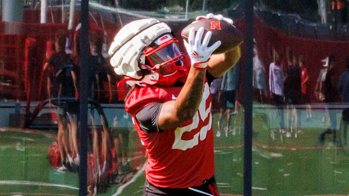 Nebraska running back Kenneth Williams catches a pass during a drill at practice Monday morning.