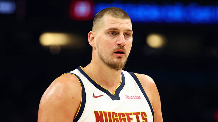 Nov 29, 2025; Phoenix, Arizona, USA; Denver Nuggets center Nikola Jokic (15) against the Phoenix Suns at the Mortgage Matchup Center. Mandatory Credit: Mark J. Rebilas-Imagn Images Nov 29, 2025; Phoenix, Arizona, USA; Denver Nuggets center Nikola Jokic (15) against the Phoenix Suns at the Mortgage Matchup Center. Mandatory Credit: Mark J. Rebilas-Imagn Images