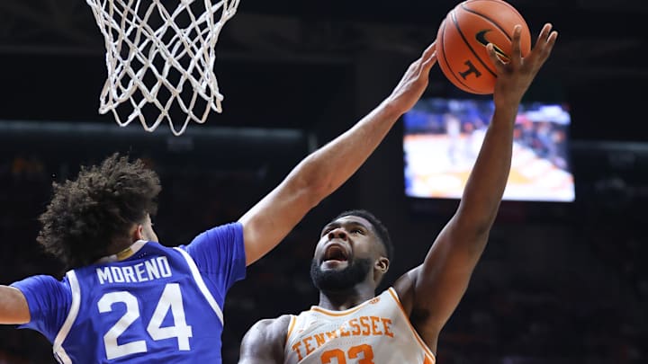 Jan 17, 2026; Knoxville, Tennessee, USA;  Kentucky Wildcats center Malachi Moreno (24) blocks a shot from Tennessee Volunteers forward Jaylen Carey (23) during the first half at Thompson-Boling Arena at Food City Center. Mandatory Credit: Randy Sartin-Imagn Images