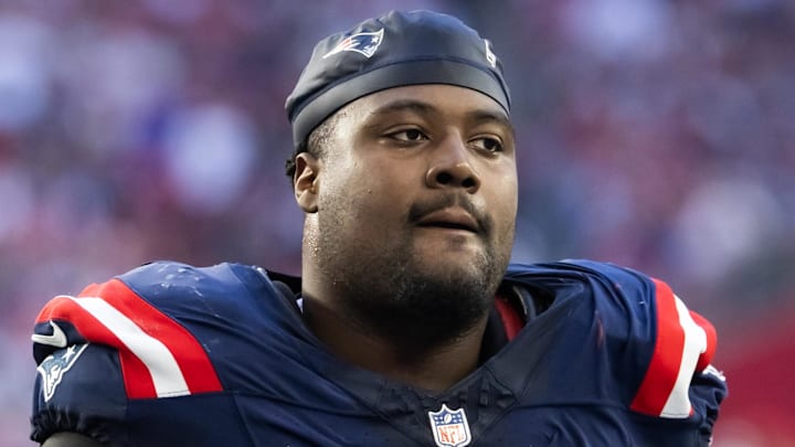 Dec 15, 2024; Glendale, Arizona, USA; New England Patriots defensive tackle Christian Barmore (90) against the Arizona Cardinals at State Farm Stadium. Mandatory Credit: Mark J. Rebilas-Imagn Images