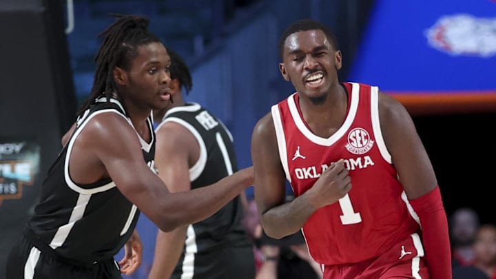 Oklahoma Sooners guard Kobe Elvis (1) and Providence Friars guard Jayden Pierre Oklahoma Sooners guard Kobe Elvis (1) and Providence Friars guard Jayden Pierre