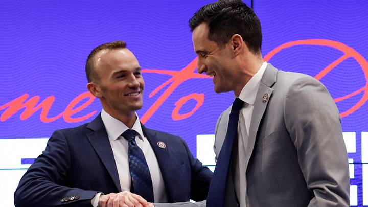 Washington Nationals manager Blake Butera shakes hands with president of baseball operations Paul Toboni Washington Nationals manager Blake Butera shakes hands with president of baseball operations Paul Toboni