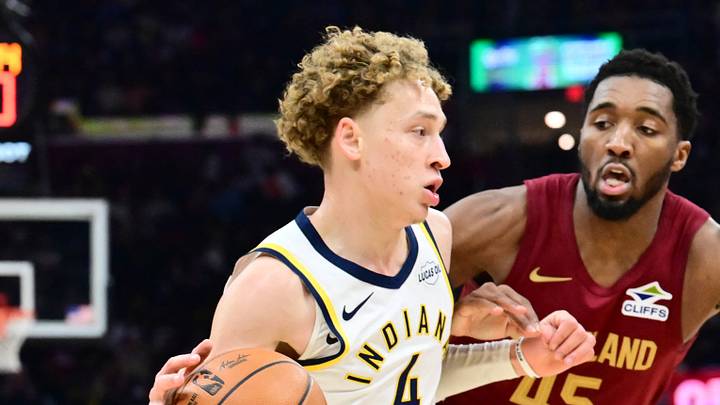 Apr 5, 2026; Cleveland, Ohio, USA; Indiana Pacers guard Taelon Peter (4) drives to the basket against Cleveland Cavaliers guard Donovan Mitchell (45) during the second half at Rocket Arena. Mandatory Credit: Ken Blaze-Imagn Images Apr 5, 2026; Cleveland, Ohio, USA; Indiana Pacers guard Taelon Peter (4) drives to the basket against Cleveland Cavaliers guard Donovan Mitchell (45) during the second half at Rocket Arena. Mandatory Credit: Ken Blaze-Imagn Images