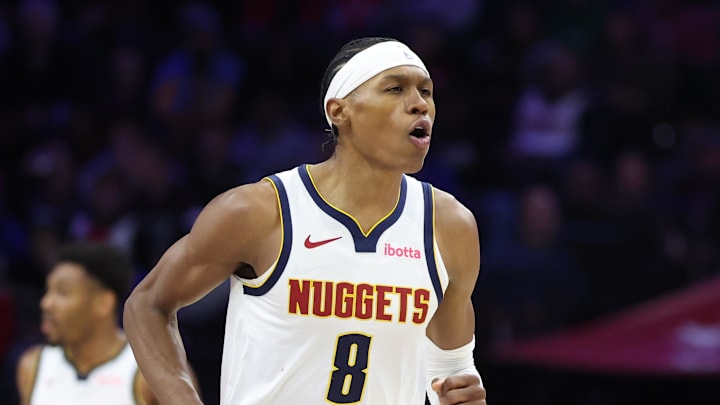 Jan 5, 2026; Philadelphia, Pennsylvania, USA; Denver Nuggets guard Peyton Watson (8) reacts to his score against the Philadelphia 76ers during the first quarter at Xfinity Mobile Arena.