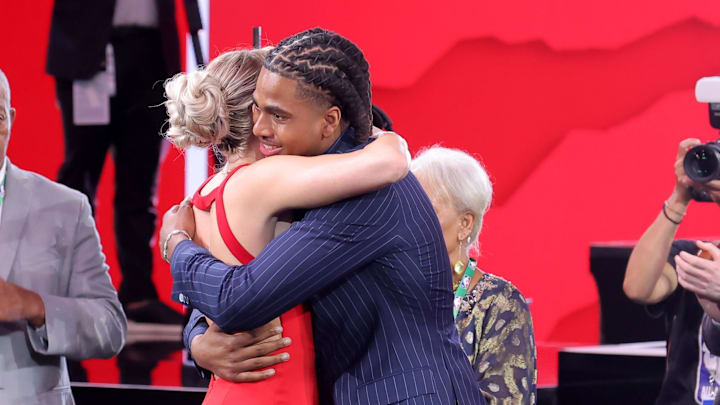 Jun 25, 2025; Brooklyn, NY, USA;  Collin Murray-Boyles embraces girlfriend Chloe Kitts after being selected as the ninth pick by the Toronto Raptors in the first round of the 2025 NBA Draft at Barclays Center. Mandatory Credit: Brad Penner-Imagn Images