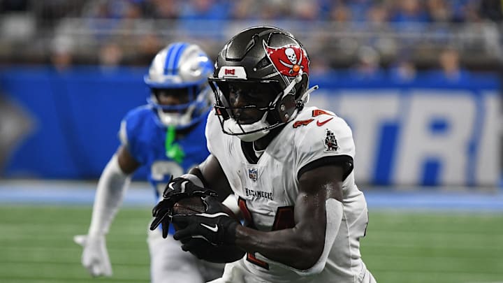 Sep 15, 2024; Detroit, Michigan, USA; Tampa Bay Buccaneers wide receiver Chris Godwin (14) scores a touchdown against the Detroit Lions in the second quarter at Ford Field. Mandatory Credit: Eamon Horwedel-Imagn Images Sep 15, 2024; Detroit, Michigan, USA; Tampa Bay Buccaneers wide receiver Chris Godwin (14) scores a touchdown against the Detroit Lions in the second quarter at Ford Field. Mandatory Credit: Eamon Horwedel-Imagn Images