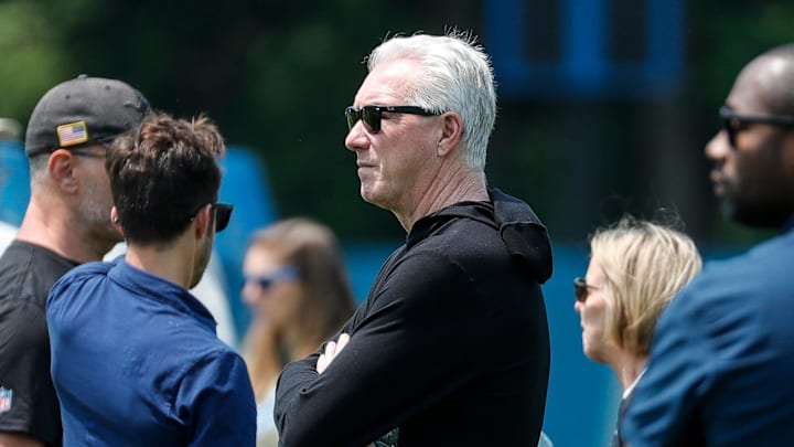 Detroit Lions president and CEO Rod Wood watches practice during mini camp 