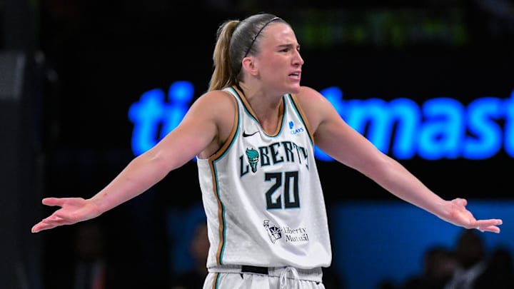 Jul 26, 2025; Brooklyn, New York, USA; New York Liberty guard Sabrina Ionescu (20) reacts to a call during the second half against the Los Angeles Sparks at Barclays Center. Mandatory Credit: John Jones-Imagn Images
