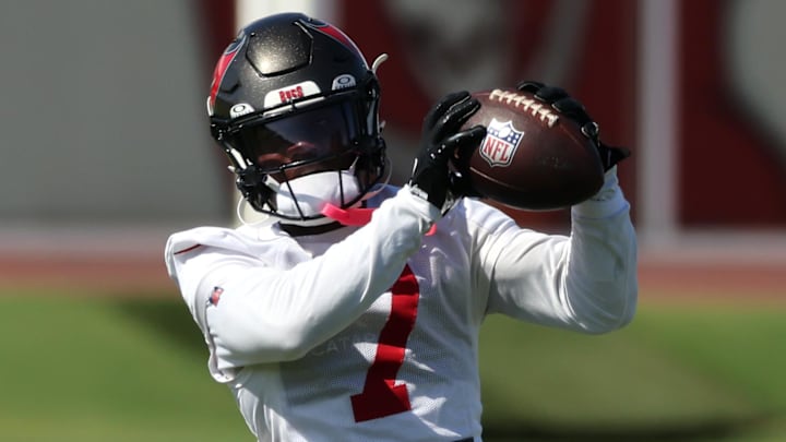 Jun 11, 2025; Tampa, FL, USA; Tampa Bay Buccaneers running back Bucky Irving (7) works out at One Buc Place. Mandatory Credit: Kim Klement Neitzel-Imagn Images Jun 11, 2025; Tampa, FL, USA; Tampa Bay Buccaneers running back Bucky Irving (7) works out at One Buc Place. Mandatory Credit: Kim Klement Neitzel-Imagn Images