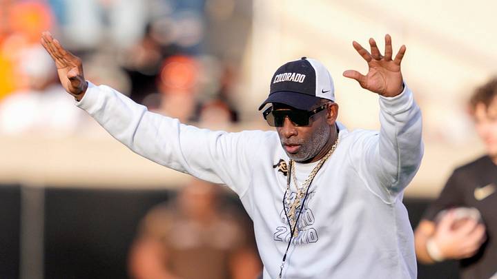 Colorado coach Deion Sanders stands on the field as the team warms up before a college football game between the Oklahoma State Cowboys (OSU) and the Colorado Buffaloes at Boone Pickens Stadium in Stillwater, Okla., Saturday, Oct. 24, 2026. Colorado coach Deion Sanders stands on the field as the team warms up before a college football game between the Oklahoma State Cowboys (OSU) and the Colorado Buffaloes at Boone Pickens Stadium in Stillwater, Okla., Saturday, Oct. 24, 2026.