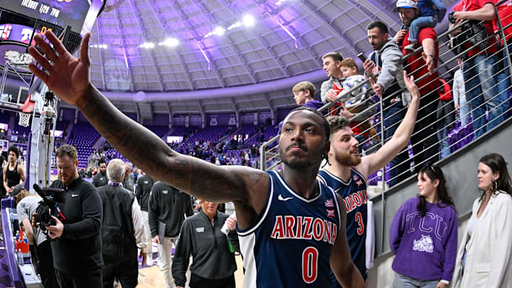 Jan 10, 2026; Fort Worth, Texas, USA; Arizona Wildcats guard Jaden Bradley (0) and center Motiejus Krivas (13) come off the court after defeating the TCU Horned Frogs at the Ed and Rae Schollmaier Arena. Mandatory Credit: Jerome Miron-Imagn Images