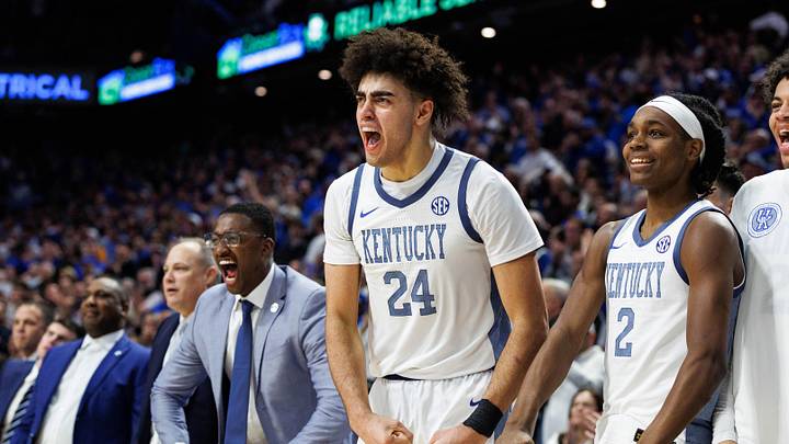 Feb 7, 2026; Lexington, Kentucky, USA; Kentucky Wildcats center Malachi Moreno (24), guard Jasper Johnson (2) and forward Braydon Hawthorne (right) celebrate from the bench during the second half against the Tennessee Volunteers at Rupp Arena at Central Bank Center. Mandatory Credit: Jordan Prather-Imagn Images