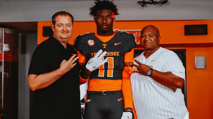 Hezekiah Harris poses for a photo with Josh Heupel and Coach Chop.