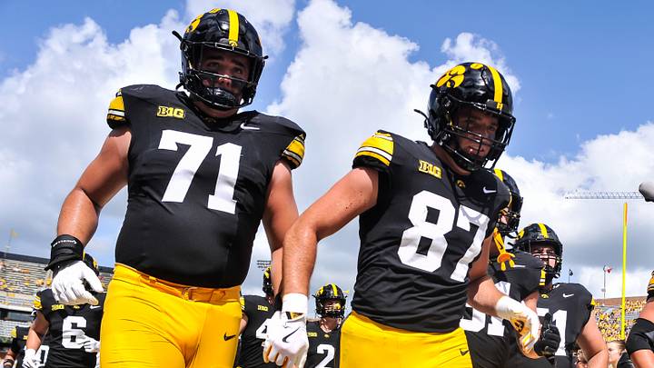 Sep 5, 2026; Iowa City, Iowa, USA; Iowa Hawkeyes offensive lineman Jack Dotzler (71) and tight end Addison Ostrenga (87) and offensive lineman Trevor Lauck (59) come off the field before the game against the Northern Illinois Huskies at Kinnick Stadium. Mandatory Credit: Jeffrey Becker-Imagn Images Sep 5, 2026; Iowa City, Iowa, USA; Iowa Hawkeyes offensive lineman Jack Dotzler (71) and tight end Addison Ostrenga (87) and offensive lineman Trevor Lauck (59) come off the field before the game against the Northern Illinois Huskies at Kinnick Stadium. Mandatory Credit: Jeffrey Becker-Imagn Images