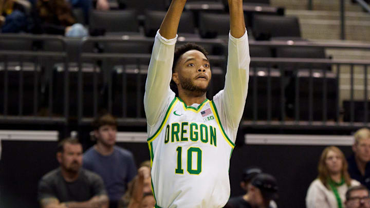 Oregon forward Kwame Evans Jr. puts up a shot as the Oregon Ducks host the UC Davis Aggies on Dec. 13, 2025, at Matthew Knight Arena in Eugene, Oregon.