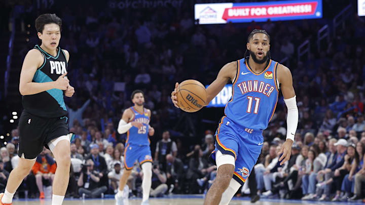 Dec 31, 2025; Oklahoma City, Oklahoma, USA; Oklahoma City Thunder guard Isaiah Joe (11) dribbles down the court against the Portland Trail Blazers during the second half at Paycom Center. Mandatory Credit: Alonzo Adams-Imagn Images