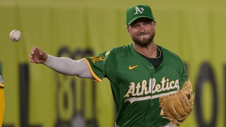 Sep 8, 2025; West Sacramento, California, USA; Athletics third baseman Max Schuemann (12) throws the ball to first against the Boston Red Sox during the third inning at Sutter Health Park. Mandatory Credit: Ed Szczepanski-Imagn Images