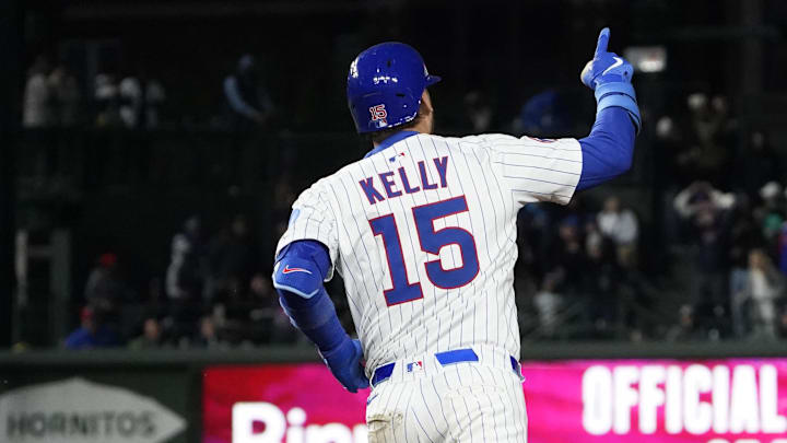 May 5, 2025; Chicago, Illinois, USA; Chicago Cubs catcher Carson Kelly (15) reacts after hitting a home run against the San Francisco Giants during the sixth inning at Wrigley Field.