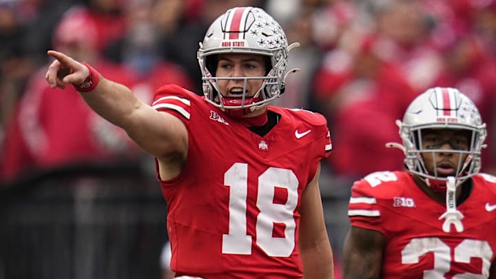 Ohio State Buckeyes quarterback Will Howard (18) signals to his offense during the second half of the NCAA football game against the Indiana Hoosiers at Ohio Stadium in Columbus on Saturday, Nov. 23, 2024. Ohio State won 38-15. Ohio State Buckeyes quarterback Will Howard (18) signals to his offense during the second half of the NCAA football game against the Indiana Hoosiers at Ohio Stadium in Columbus on Saturday, Nov. 23, 2024. Ohio State won 38-15.